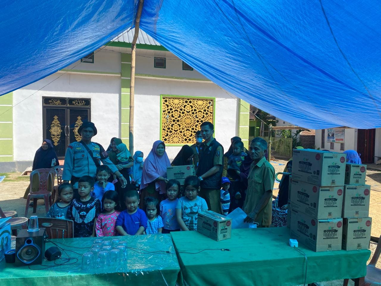 Personel Polsek Mambi Laksanakan Monitoring Penyaluran Bantuan Dari Puskesmas Mambi