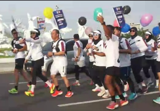 Sembari Jogging Ditlantas Polda Sulsel Sosialisasi Pilkada Damai dan Tertib Berlalulintas