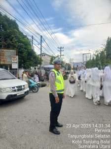 Polres Tanjung Balai Kawal dan Amankan Pawai Ta’aruf Pembukaan MTQ ke-57 Kota Tanjung Balai