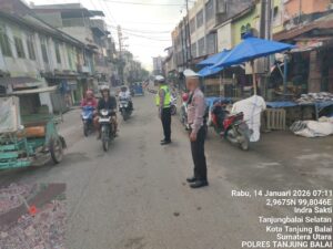 Sat Lantas Polres Tanjung Balai Kawal Pagi Hari Masyarakat: Arus Lalu Lintas Aman dan Kondusif