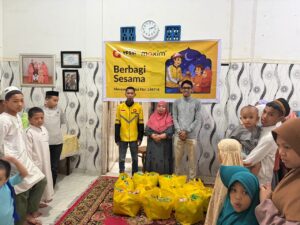 Rayakan Semangat Berbagi di Bulan Suci Ramadan, Maxim Salurkan Santunan Anak Yatim di Makassar