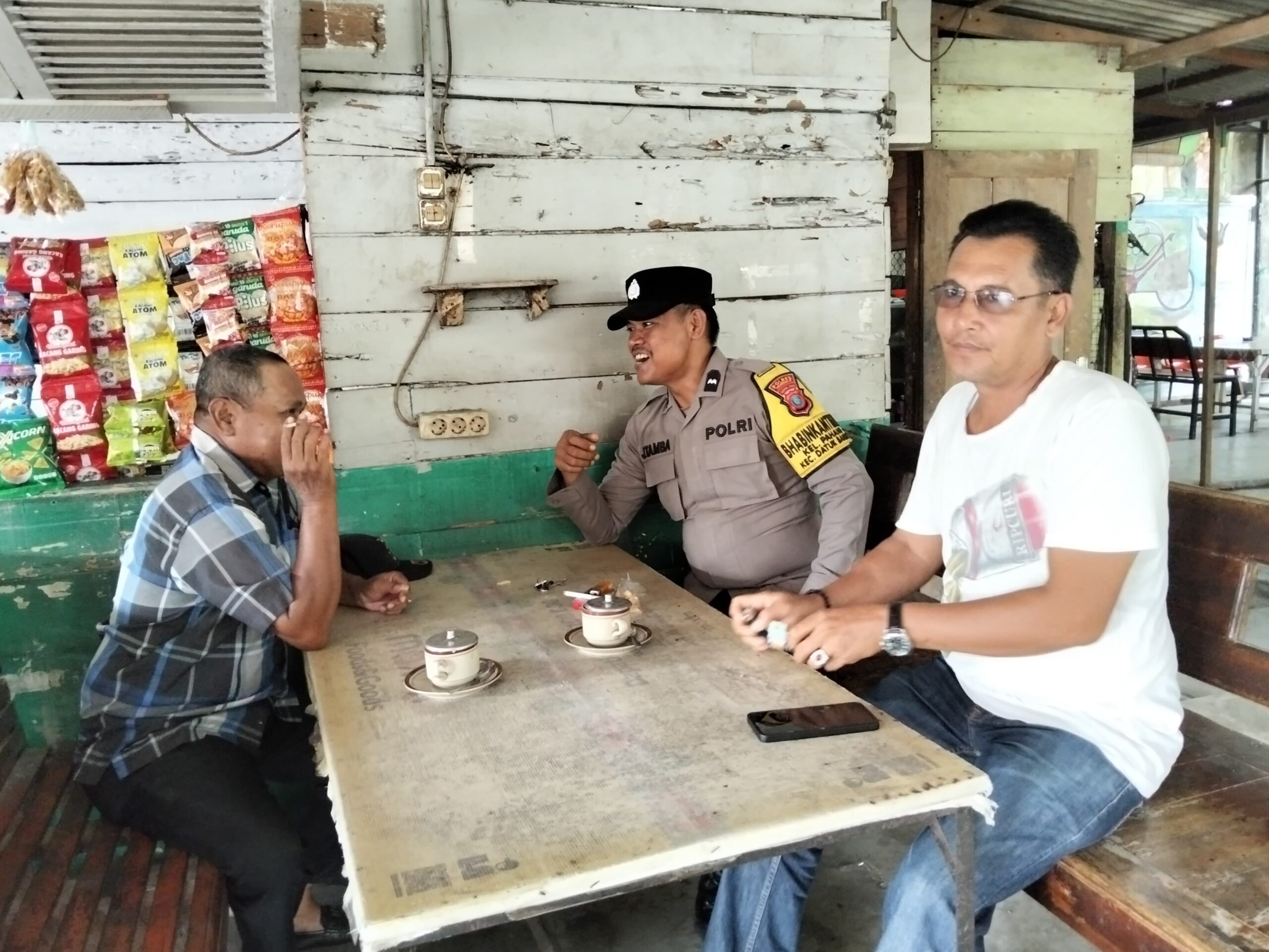 Jaga Kamtibmas, Bhabinkamtibmas Polres Tanjung Balai Sambangi Warga 